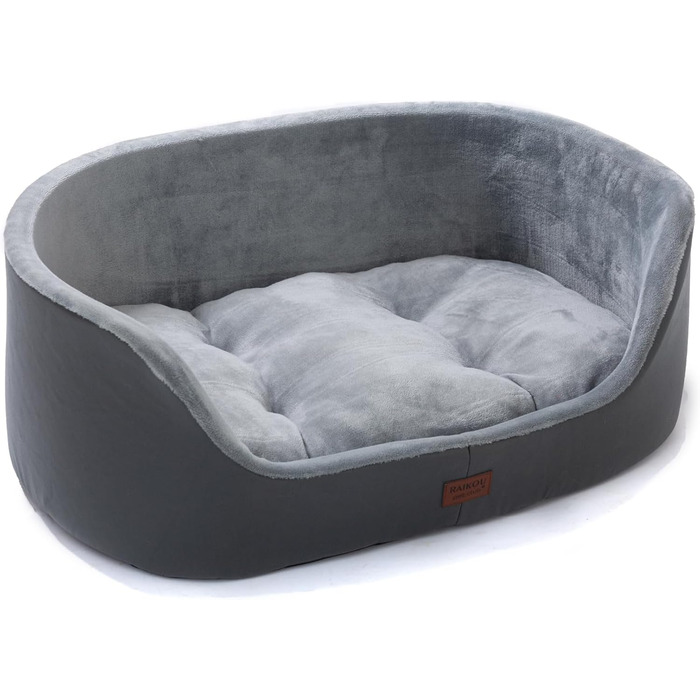 Кругле собаче ліжко RAIKOU середнього розміру, м'яке та зручне, з антиковзким покриттям. Підходить для собак та котів середніх порід (75 x 54 x 27 см), чорного кольору