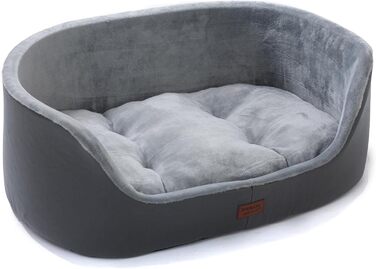 Кругле собаче ліжко RAIKOU середнього розміру, м'яке та зручне, з антиковзким покриттям. Підходить для собак та котів середніх порід (75 x 54 x 27 см), чорного кольору