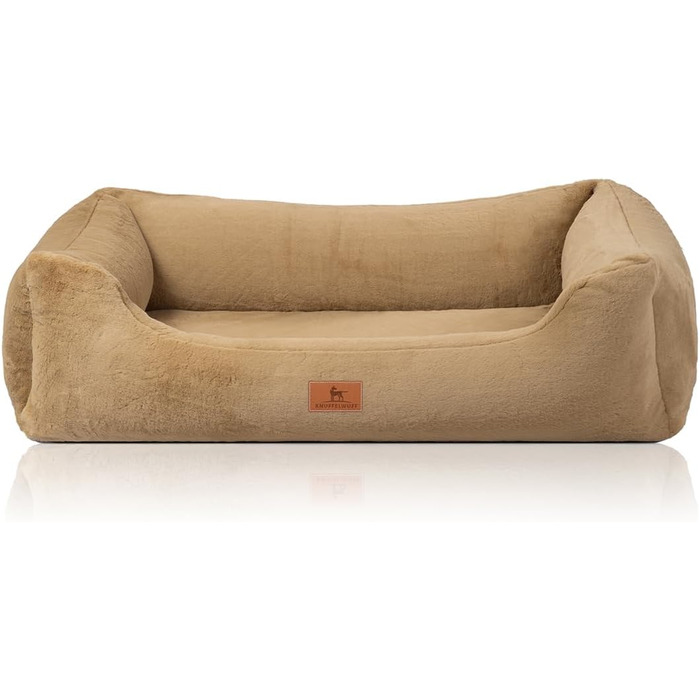 Ортопедичне собаче ліжко Knuffelwuff з штучним хутром кролика, розмір M-L, 85 x 63 см, коричневе. Знімний, пральний чохол. Підходить для собак великих, середніх та маленьких порід. Розміри: 85 x 63 x 23 см.
